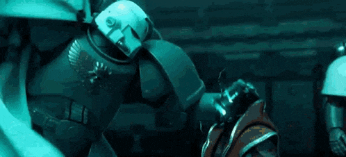 a group of soldiers are standing next to each other in a dark room in a video game .
