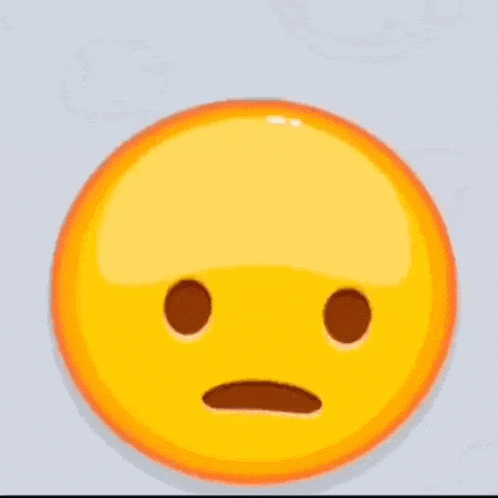a cartoon smiley face with a nuclear explosion coming out of it 's mouth .