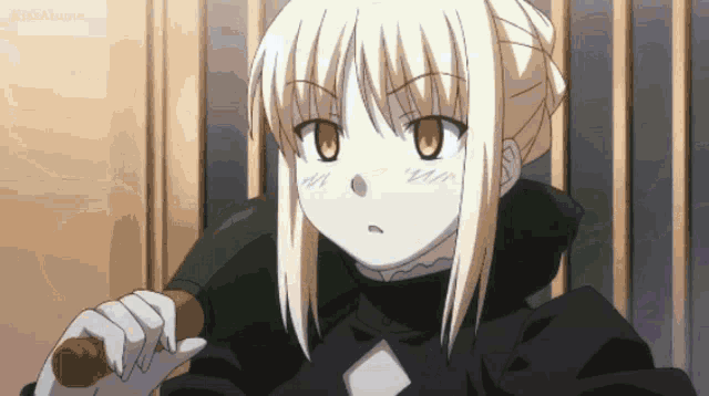 a blonde haired anime girl is holding a stick in her hand .