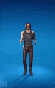 a man with a robot arm is standing with his arms in the air on a blue background