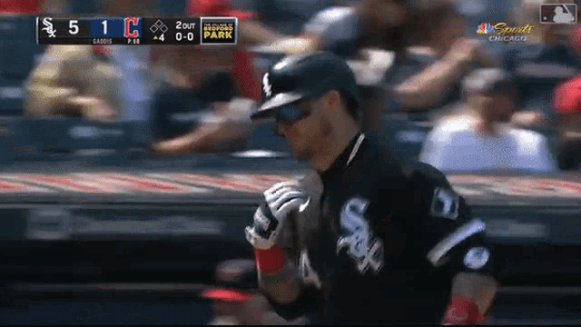 a baseball game is being played in chicago and the score is 5 to 1