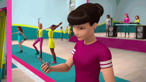 a woman in a pink shirt is holding a cell phone in front of a group of barbie dolls