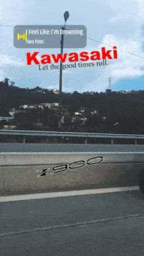 a kawasaki advertisement that says feel like i 'm drowning two feet let the good times roll