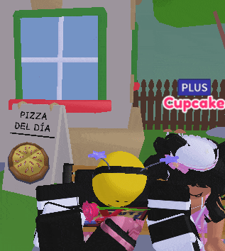 a sign that says " pizza del dia " next to a window