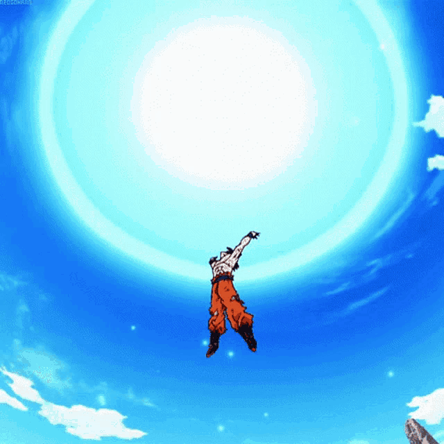 a man in orange pants is flying through the air in front of a blue circle