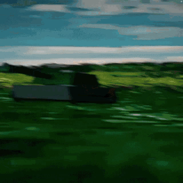 a painting of a green field with a blue sky