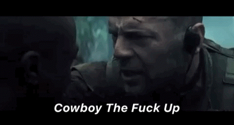 a man talking to another man with the words " cowboy the fuck up " below him