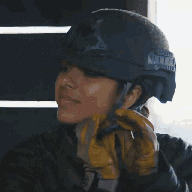 Putting On Helmet Michelle Khare GIF - Putting On Helmet Michelle Khare Get Ready GIFs