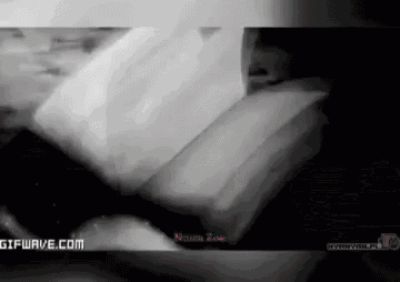 a black and white photo with the website gifwave.com in the corner