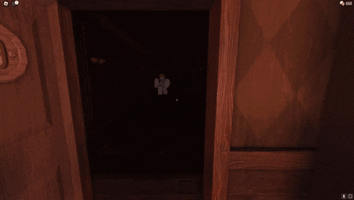 a screenshot of a video game shows a person standing in the dark