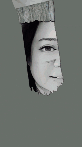a black and white photo of a woman with a yellow paint brush