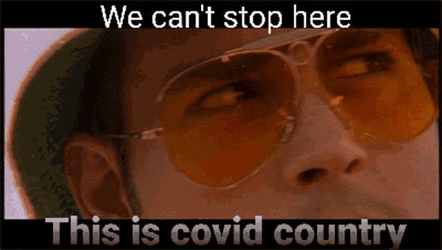 a man wearing sunglasses and a hat says we can 't stop here