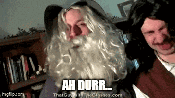 a man with a beard is standing next to another man and says ah durr .