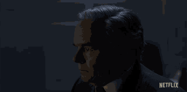 a close up of a man 's face with netflix written in the corner