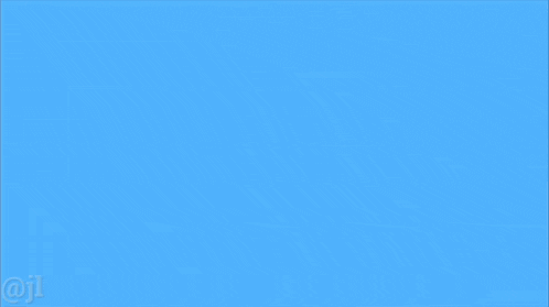 a blurred image of a cartoon character with a blue background