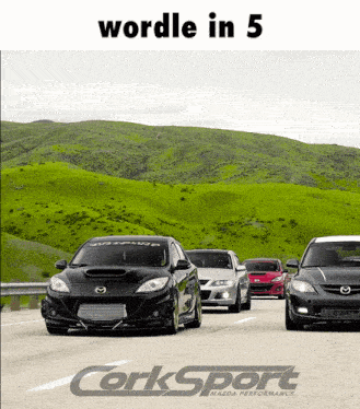 a group of cars are driving down a road and the word corksport is on the bottom