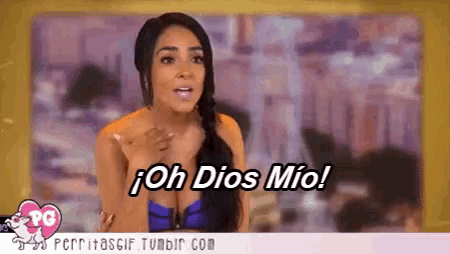 a woman says " oh dios mio " while pointing at something