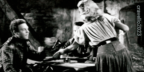 a black and white photo of a man and a woman with the watermark crvelli2023