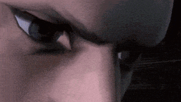 a close up of a person 's eyes with a serious look on their face