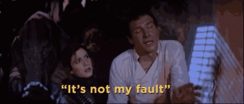 a man and a woman are standing next to each other with the words " it 's not my fault " written above them
