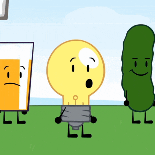 a light bulb a glass of beer and a pickle are standing in the grass