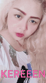 a woman 's face is shown with the word kereeen in pink letters