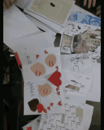 a bunch of papers on a table one of which says passion
