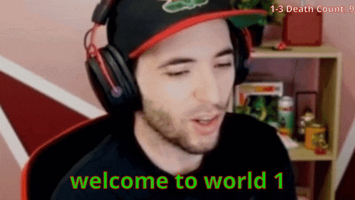 a man wearing a hat and headphones says welcome to world 1