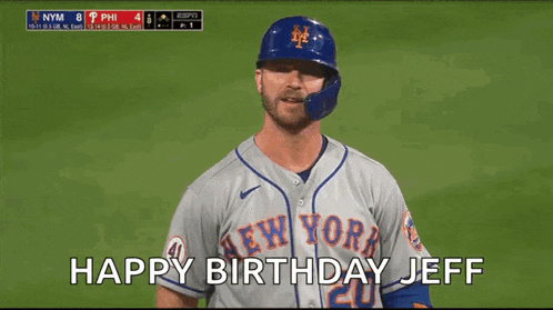 a baseball player in a new york mets uniform is blowing a kiss at the camera .