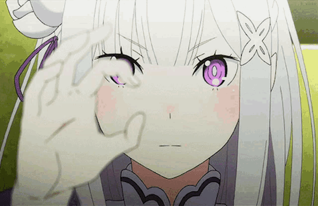 a girl with white hair and purple eyes is making a heart shape with her hands
