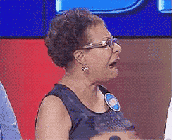 an older woman wearing glasses and a name tag that says ' amanda '