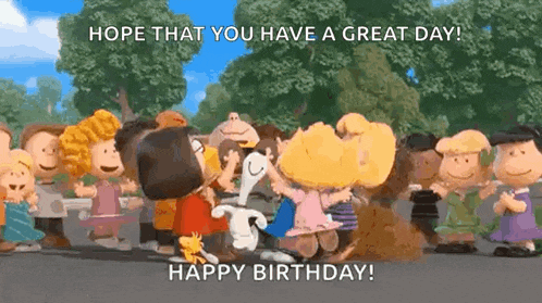 a group of peanuts characters are standing next to each other .