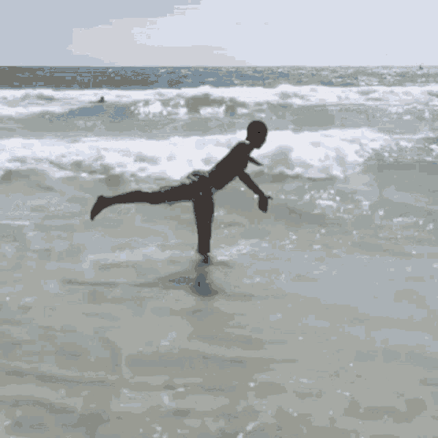 a person is doing a trick on a surfboard in the water