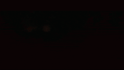 the sun is shining through the smoke in the dark