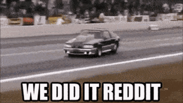 a car is driving down a road with the words we did it reddit written on the bottom