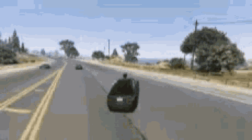 a car is driving down a highway with a license plate that says ' aa ' on it