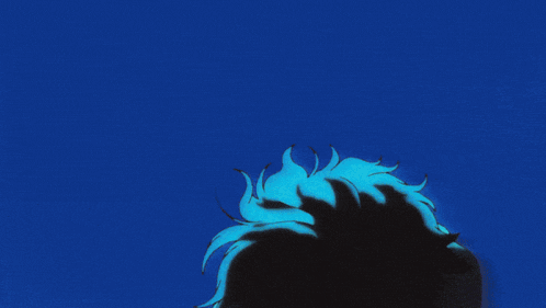a person 's arm is visible in a blue background surrounded by blocks
