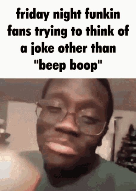 a man wearing glasses and a green shirt is making a funny face .