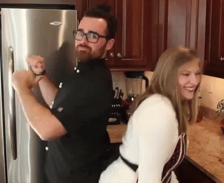 Fit Couple Cooks Booty Bump GIF - Fit Couple Cooks Booty Bump GIFs