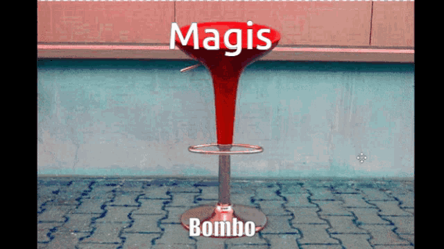 a red bar stool with the word magis bombo on it