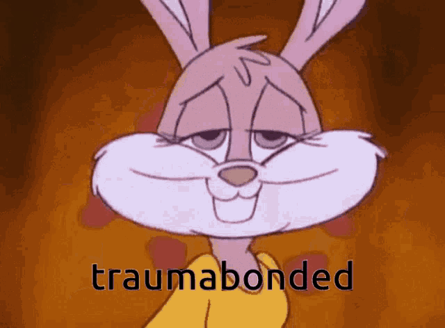 a cartoon of a bunny with the word traumabonded on the bottom