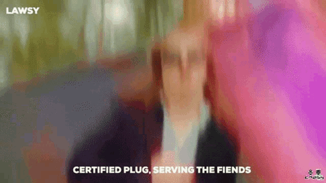 a blurry picture of a person with the words certified plug serving the fiends written on the bottom