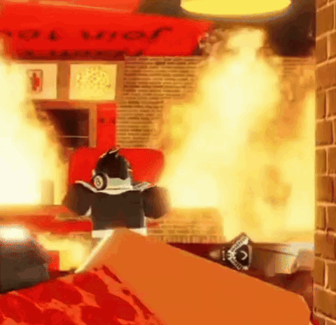 a person in a video game is standing in front of a pizza oven that is on fire .