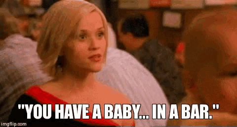 a woman in a red dress says " you have a baby ... in a bar " .