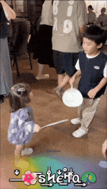 a boy and a girl are playing with a frisbee and the word sherpa is on the bottom
