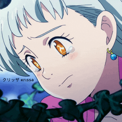 a close up of a girl 's face with krissa written on the bottom right
