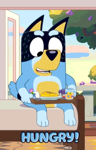 a cartoon dog is sitting on a couch holding a tray of food with the word hungry written below it