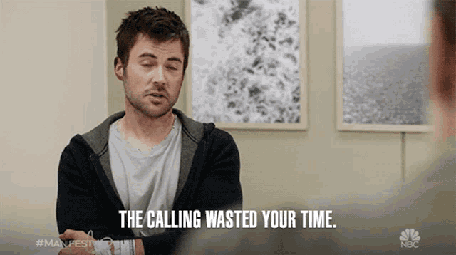 a man says " the calling wasted your time " in front of a painting