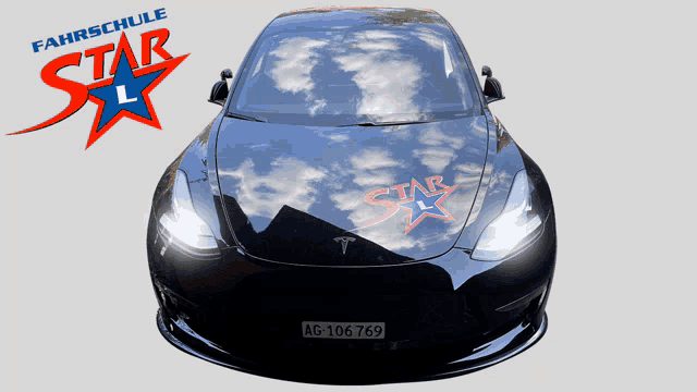 a black car with a star l logo on the side