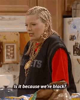 a woman in a kitchen says is it because we 're black ..